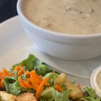 Chowder & Salad · Bowl of Clam Chowder with side garden salad tossed with herb  balsamic vinaigrette and dinne...