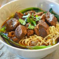 紅燒牛腩麵 Braised Beef Stew Noodle Soup · Slow-cooked beef, bok choy, egg noodles.