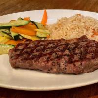 New York Steak · Eight (8) ounce New York trip loin grilled