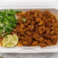 The Bowl · Your choice of meat, served with refried or pinto beans, rice, onion, cilantro, lime wedge a...