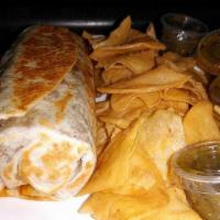 The Burrito · Your choice of meat, your choice of refried or pinto beans, rice, onions, cilantro and cream...