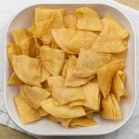 Chips · Fresh, fried to order,  corn tortilla chips.