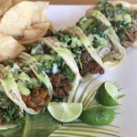 Hard Taco Plate · Your choice of two hard tacos topped with lettuc, guacamole sauce, and cheese.  Served with ...