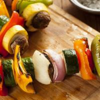 1 Skewer Of Grilled Vegetables · Grilled onions, tomatoes, bell peppers, eggplants and zucchini.
