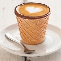 Macchiato · Espresso with steamed milk.