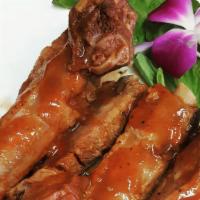 Bbq Pork Spareribs · Marinated tender pork spare ribs. Served with sauce.