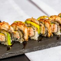 Dragon Roll · 8 Pieces.

Inside: Crab Meat. 
Top: Fresh Water Eel, Avocado & Sesame Seeds with Sushi Sauce.