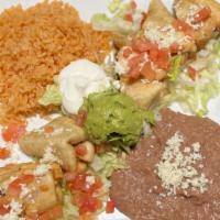 Flautas · Crispy flour tortillas rolled with your choice of chicken or shredded beef and Jack cheese. ...