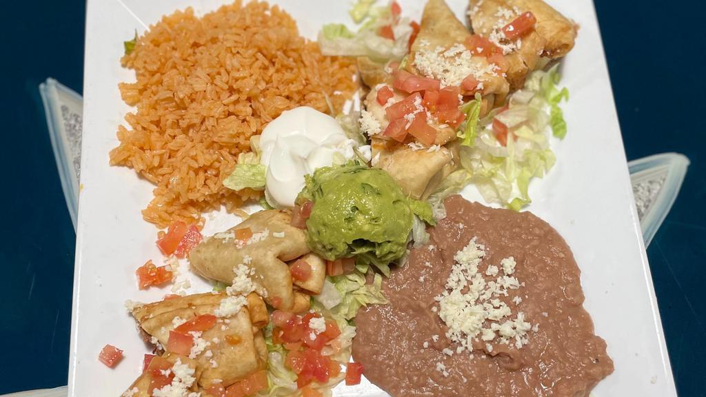 Flautas · Crispy flour tortillas rolled with your choice of chicken or shredded beef and Jack cheese. Topped with tomato and cotija cheese. Served with sour cream, guacamole, red rice and refried beans.