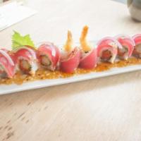 Cosmic Roll · Spicy tuna & shrimp tempura roll with pepper seared ahi tuna, red onions, yuzu-wasabi dressi...