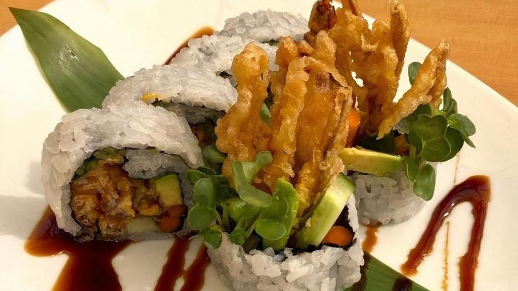 Spider Roll · Deep fried soft-shell crab, avocado, gobo, . cucumber, eel sauce & kaiware sprouts.