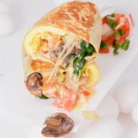 Veggie Breakfast Burrito · Flour tortilla with scrambled eggs, spinach, grilled mushrooms, grilled bell peppers, grille...