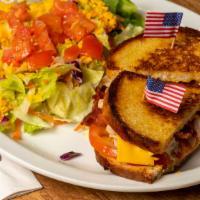 Dodo Bird · turkey, bacon, tomato, and melted American cheese on sourdough.
