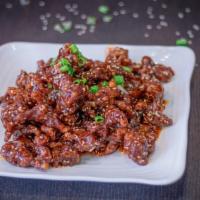 Sesame Beef · Strips of crispy beef wok fried in sweet sesame sauce.