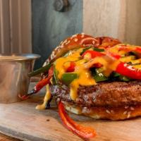 Cinco De Pepper Burger · pepper-crusted beef patty, beer cheese sauce, poblano pepper, jalapeno pepper, red bell pepp...