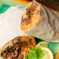 Asada Burritos · Citrus Marinaded Beef, Flour tortilla, Beans, Rice, Onion, Cilantro.  Add guacamole sauce an...