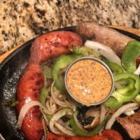Sausage & Brat Trio · Hot andouille and mild Italian links are cooked in craft beer along with savory bratwurst, c...
