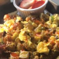 Potato Scramble Breakfast · Potato, cheddar cheese, 2 eggs, onion, and bell pepper, topped with sour cream. Served with ...