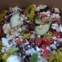 Greek Salad · Cucumber, tomato, onion, feta cheese, olives, pepperoncini, bell pepper, and Greek dressing.