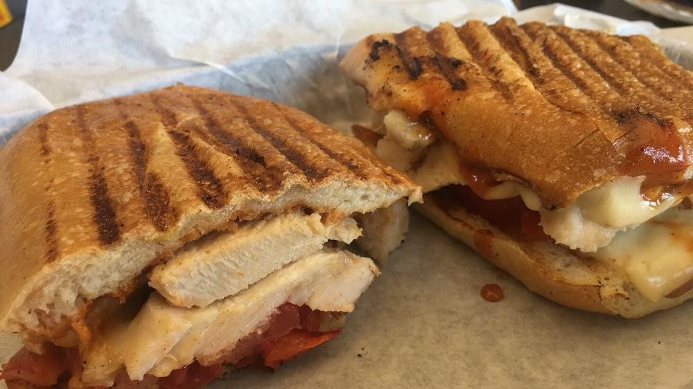 Chipotle Chicken Panini · Grilled chicken breast, pepper jack cheese, caramelized onion, tomato, roasted red bell peppers, chipotle sauce, on sourdough.