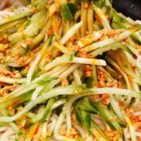 Dan Dan Noodles · Peanut. Spicy. Vegetarian. Sesame sauce, chili oil, cucumber, peanuts, cilantro.