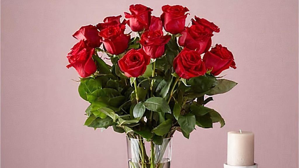 18 Long Stem Red Roses · This classic Long Stem Red Rose Bouquet is a powerful symbol of passion or gratitude for anyone special in your life. One of the most iconic flowers of all, your recipient will feel nothing but love when these stunning roses arrive. Vase included. Item # B59D