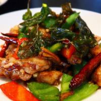 Pad Cha Fillet · Comes with finger roots, basil, fresh pepper seeds, bell peppers sautée with Thai chili sauce.