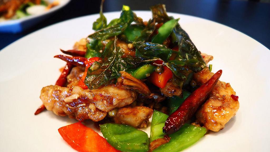 Pad Cha Fillet · Comes with finger roots, basil, fresh pepper seeds, bell peppers sautée with Thai chili sauce.