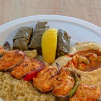 Chicken Kabob Plate · All natural white meat chicken breast- served on a bed of rice with your choice of two sides...