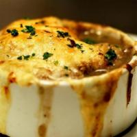 French Onion Soup · stock, carmelized onions, crostinis, swiss cheese