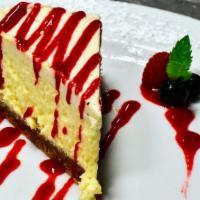 Cheesecake · new york style cheesecake, house made raspberry puree