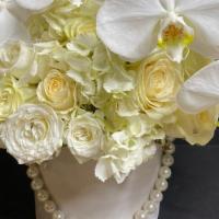 Get Well Soon · Designer choice florals arranged in a hatbox for that special someone. Flowers and hatbox su...