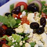 Chicken Greek Salad · Romaine, Tomato, Cucumber, Red Onion, Bell Pepper, Kalamata Olives & Feta Tossed in a Vinaig...
