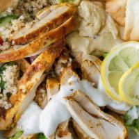 Falafel Vegan Bowl · Falafel Patties, Rice, Hummus, Salad, Pita Chips & Tahini Sesame Sauce