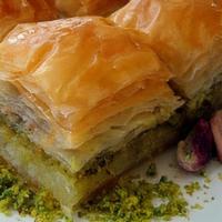 Baklava (3 Pcs.) · Philo Dough Pastry Triangles (3 pcs.) with Walnuts, Pistachios & Honey.