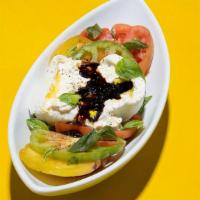 Tomato Burrata Salad · Heirloom tomato, buratta, arugula, vegan caviar