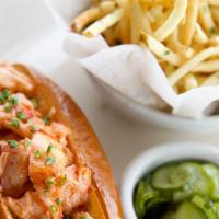 Lobster Roll  · Little Gem Lettuce, Japanese Mayo on a Toasted Butter Roll with Pickled Cucumber. Served wit...
