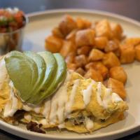 Carne Asada Omelette · grilled carne asada, grilled peppers and onions, jalapenos, cheddar, sour cream, avocado

se...