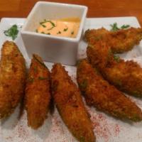 Rk Avocado Fries · Deep fried and served with Sriracha mayo dip.