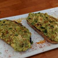 Avocado Toast · Ginger, Thai basil, chili flakes, and seven grain toast.