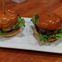 Fried Green Tomato Sliders · Two sliders with avocado, lettuce, and bac'n aioli.