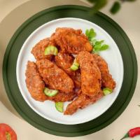 Hot Shot Nashville Wings · Fresh chicken wings breaded, fried until golden brown, and tossed in Nashville Hot Sauce. Se...