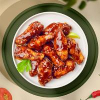 Smokey Bbq Sizzlers Wings · Fresh chicken wings breaded, fried until golden brown, and tossed in barbecue sauce. Served ...