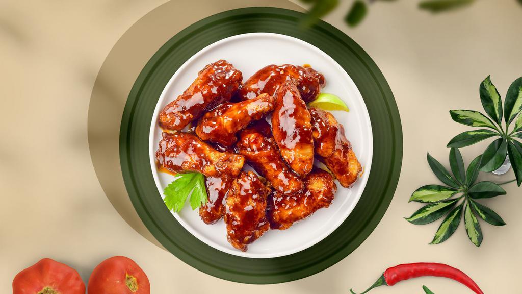 Smokey Bbq Sizzlers Boneless Wings · Fresh boneless chicken wings breaded, fried until golden brown, and tossed in barbecue sauce. Served with a side of ranch or bleu cheese.