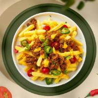Chili Billy Cheese Fries · Idaho potato fries cooked until golden brown and garnished with salt, melted cheddar cheese,...
