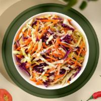 Coleslaw Craze · Shredded cabbage and carrots dressed in mayonnaise and apple cider vinegar.