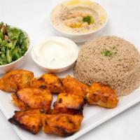 Chicken Kabob · Two skewers of chicken kabob (boneless skinless chicken chunks), rice, hummus, pickles Medit...