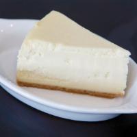 Homemade Cheesecake · New York style cheesecake. Served on a Graham cracker crust.