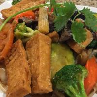 Wide Noodle With Mixed Veggies And Fried Tofu · 