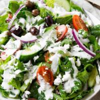 Greek Salad  · Lettuce , Tomato , Cucumber , Black Olives , Feta Cheese , Greek Dressing